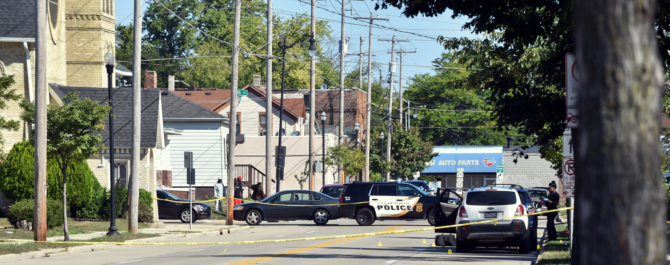 From scene of triple shooting on Racine Street, as of Monday morning